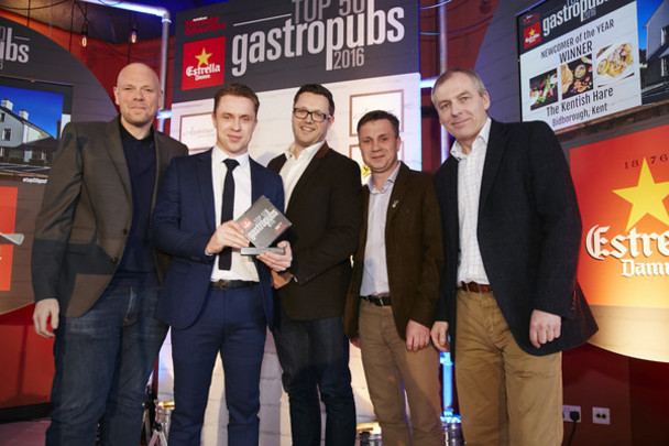 Chris Tanner, James Tanner & General Manager Melvyn Strange pick up the award for best newcomer presented by 2 Michelin started chef Tom Kerridge 